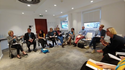 People sitting in a room during the workshop