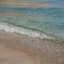 Eine Welle am Strand. 